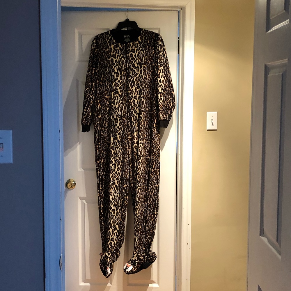 Zip up footie PJ for adults. Leopard design.